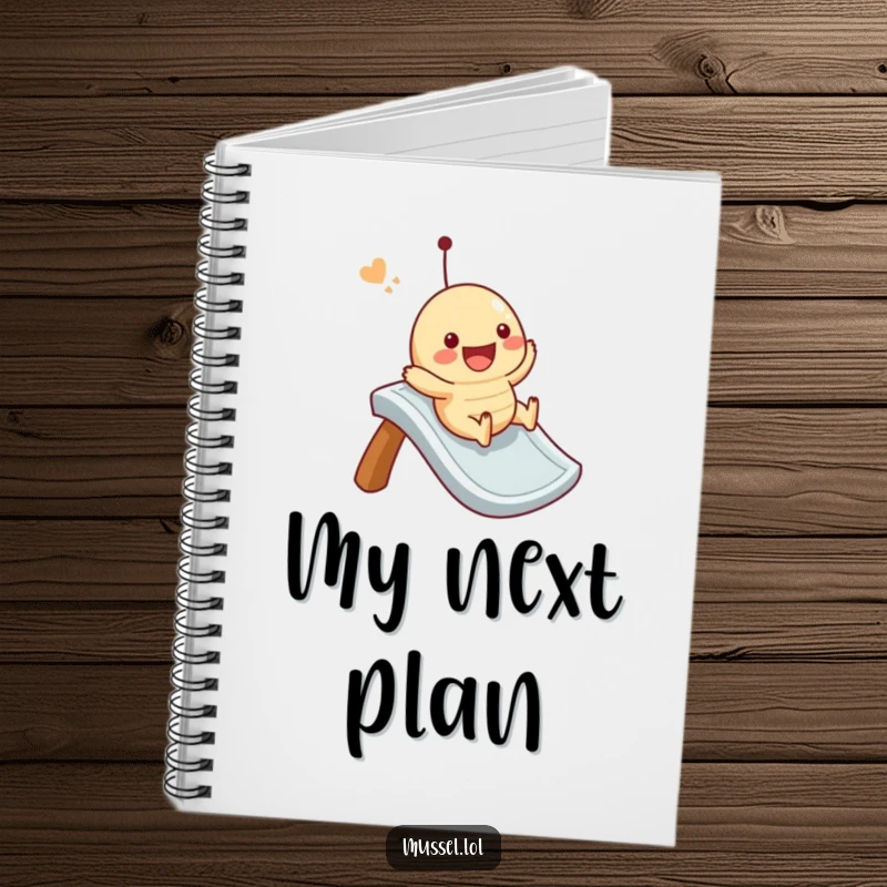 Funny mussel notebook with a character joyfully sliding down an imaginary ramp on the cover, perfect for note-taking.